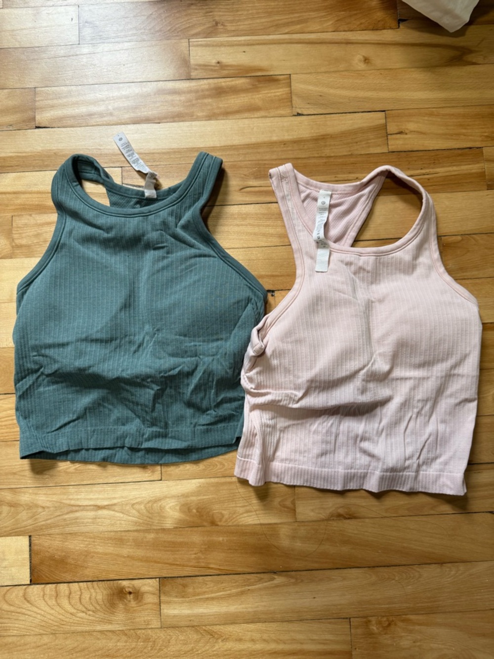 Lululemon set of 2 tanks size 4 - pink and green couple snags see pics.